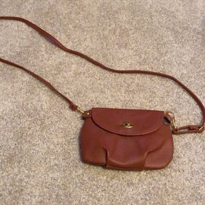 Small cross body purse with adjustable strap